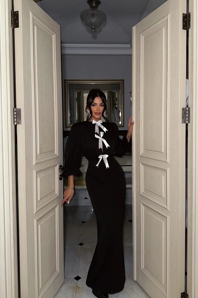 Црн фустан со долги ракави со балончиња